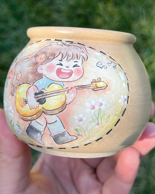 Happy Girl Playing Guitar Planter