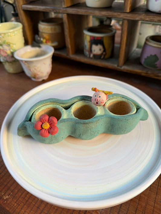 Peapot piggy planter